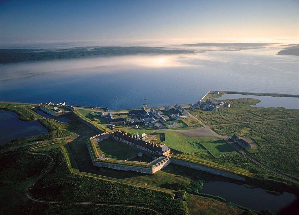 An aerial view of the Fortress of Louisbourg and its ramparts beside the sea