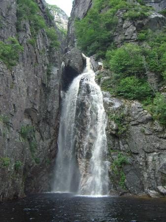 A waterfall dropping through a rocky gorge in western Newfoundland