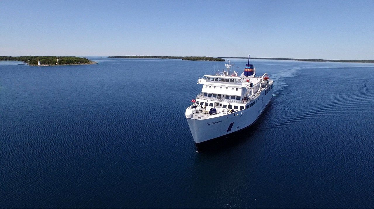 The Chi-Cheemaun ferry crossing calm blue water