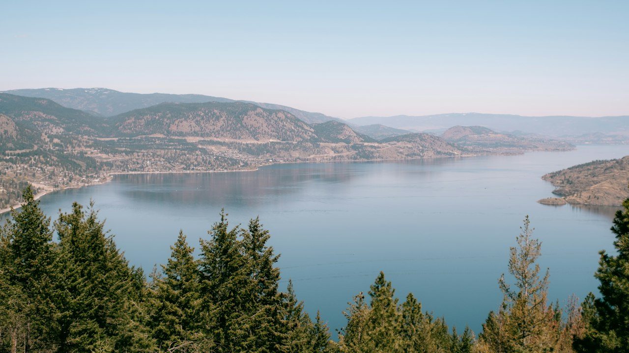 Okanagan Lake and the surrounding dry hills seen from a hillside viewpoint