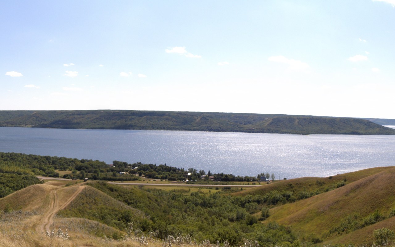A lake and rolling hills in Saskatchewan's Qu'Appelle Valley